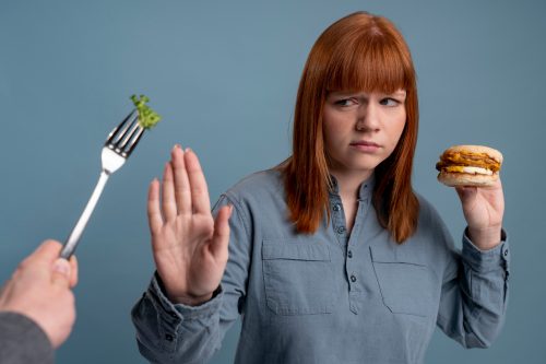person-with-eating-disorder-trying-eat-healthy